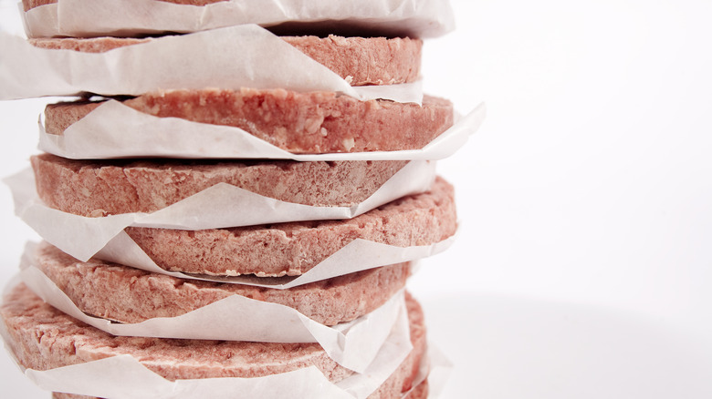 stack of frozen hamburger patties