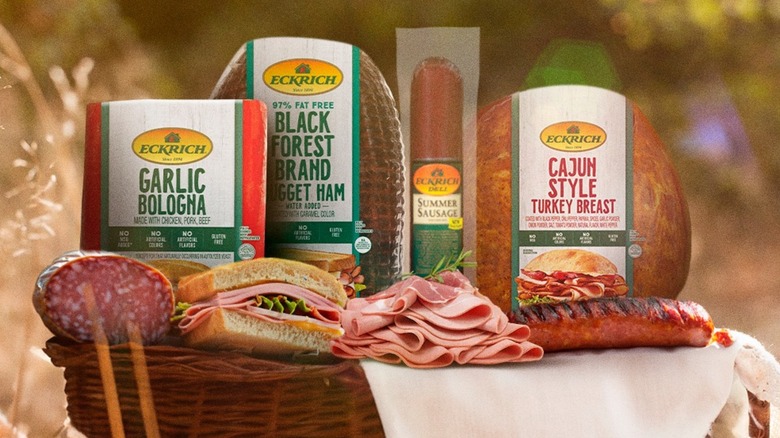 Assortment of Eckrich deli meats outside on picnic basket