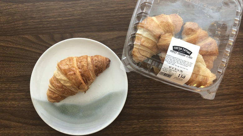 Fresh Thyme croissant on a plate.