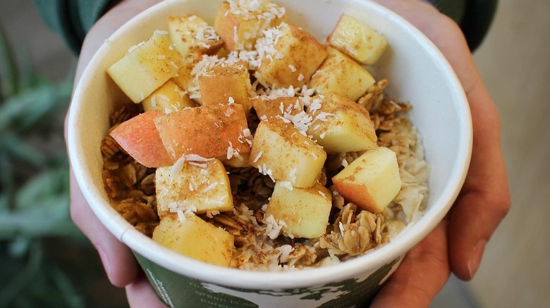 Apple Cinnamon Crunch Oatmeal in a bowl from Kure