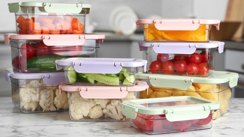 cut raw vegetables in containers