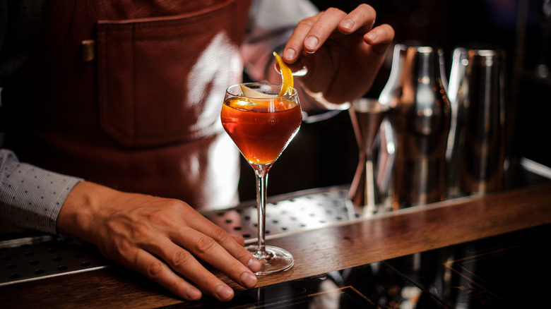 Wine glass on bar grate