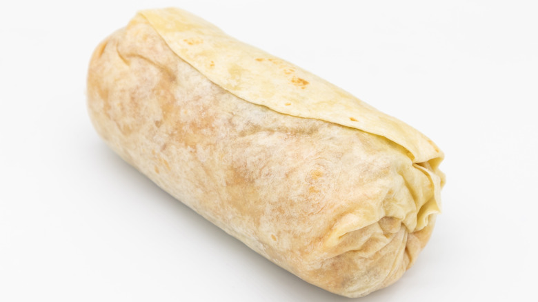 A large overfilled burrito