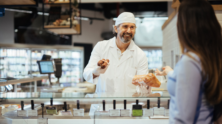 A butcher with meat