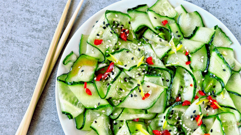 Cold cucumber salad with chopsticks