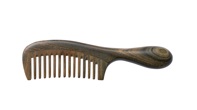 Hair comb with handle