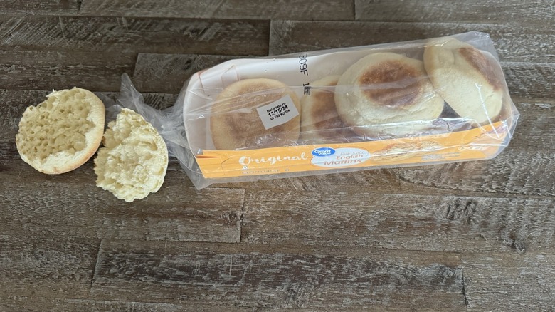 Great Value English muffins in and out of the package on a wooden table