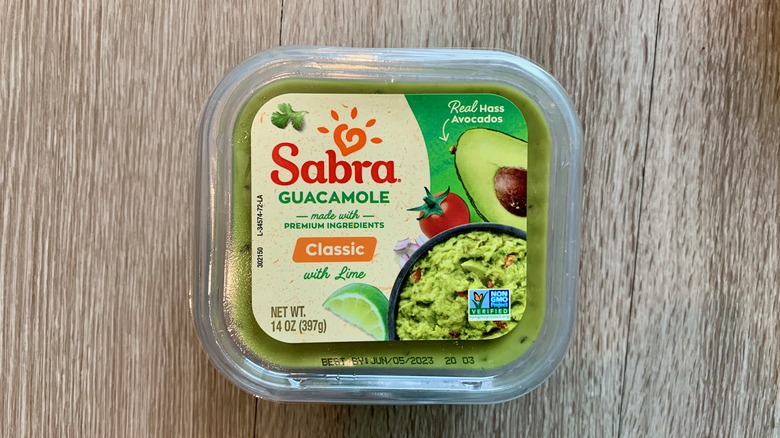 Sabra Guacamole Container on table