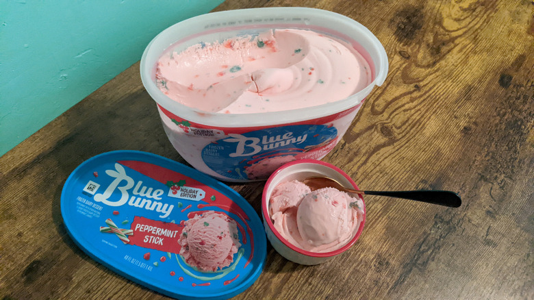 Bowl of Blue Bunny Peppermint Stick ice cream next to carton