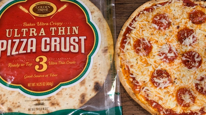 Bag of large, rustic pizza crusts labeled "ultra thin pizza crust" next to cheesy pepperoni pie