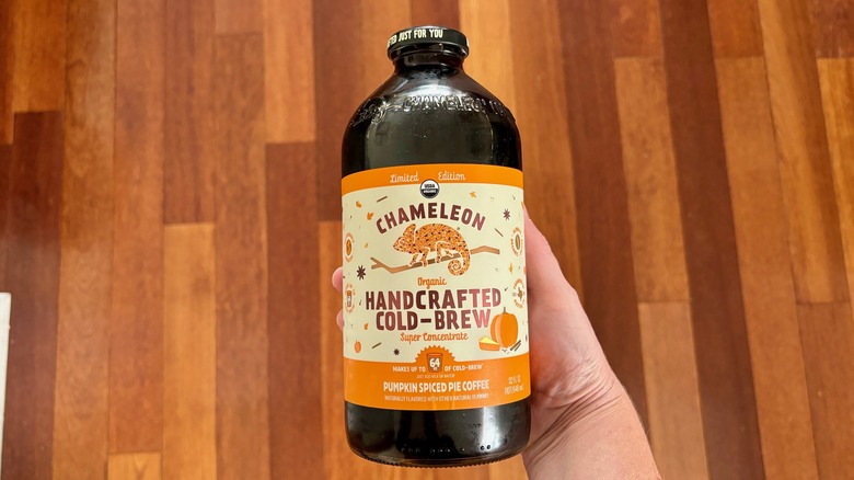 Holding bottle chameleon cold brew