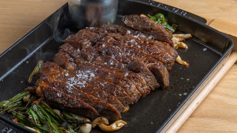 sliced wagyu beef on a plate