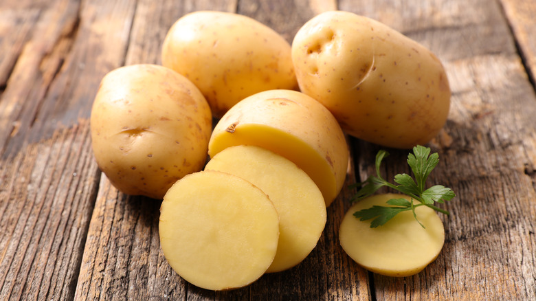 sliced white potatoes on table