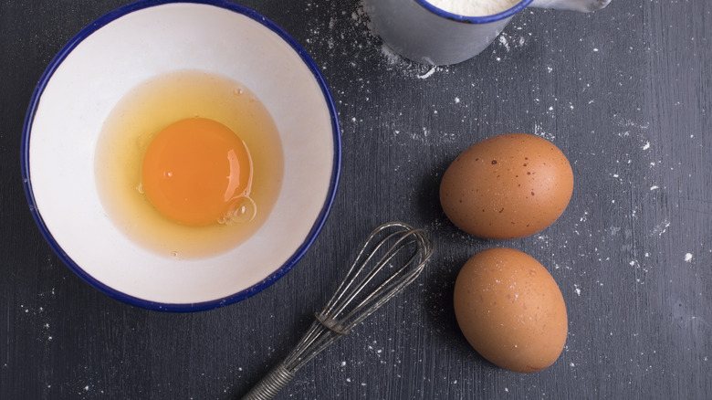 Cracked egg in a bowl