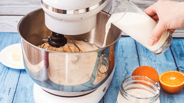 Milk being added to batter 