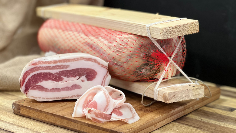 Regional version of pancetta that's pressed into an oval shape with wooden boards