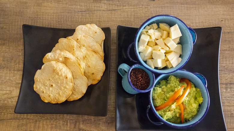 Tostadas with cheese and guacamole