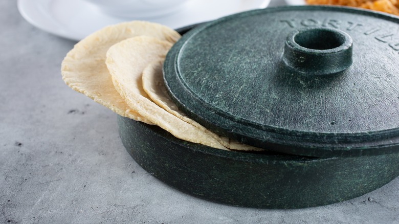 Tortillas sticking out of warmer