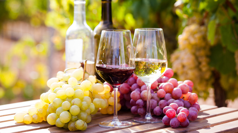 grapes with two glasses of wine