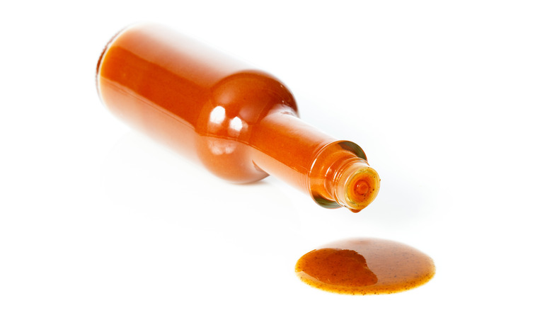 Bottle of hot sauce tipped over