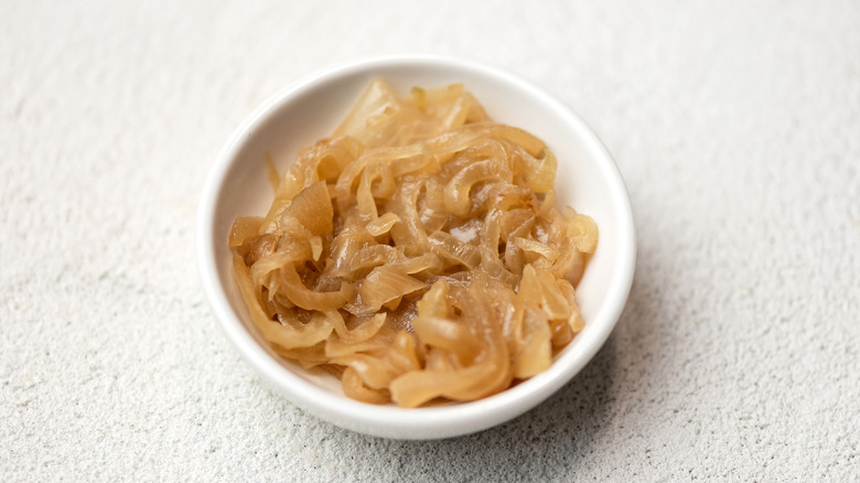 Caramelized onions in a white bowl