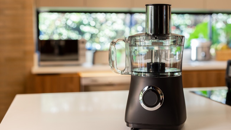 Food processor on table in kitchen