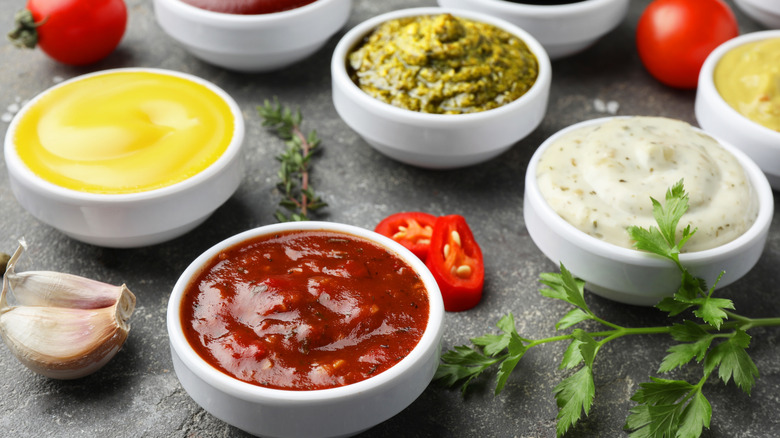 Small bowls of various dipping sauces