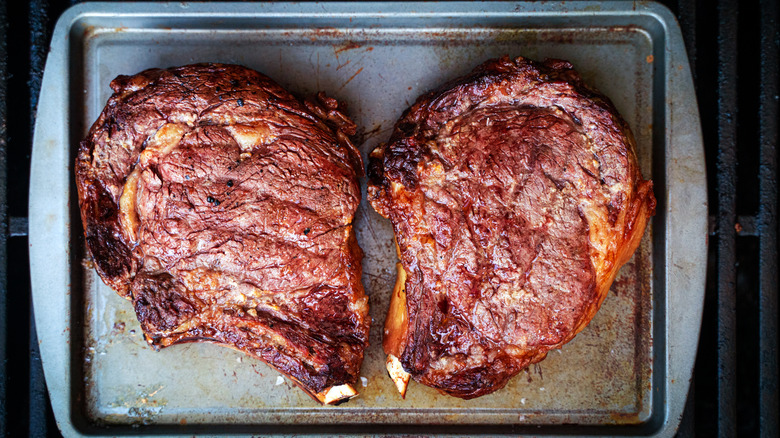 Two steaks resting