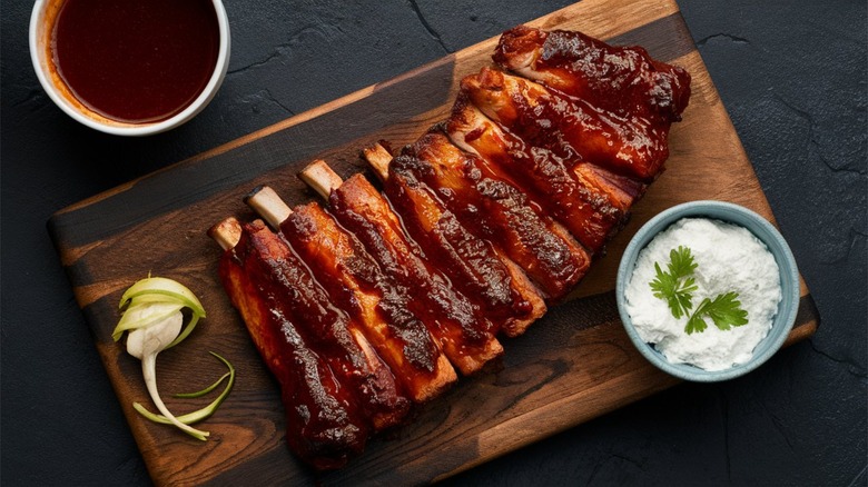 ribs on wooden board