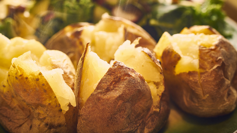 steaming hot baked potatoes