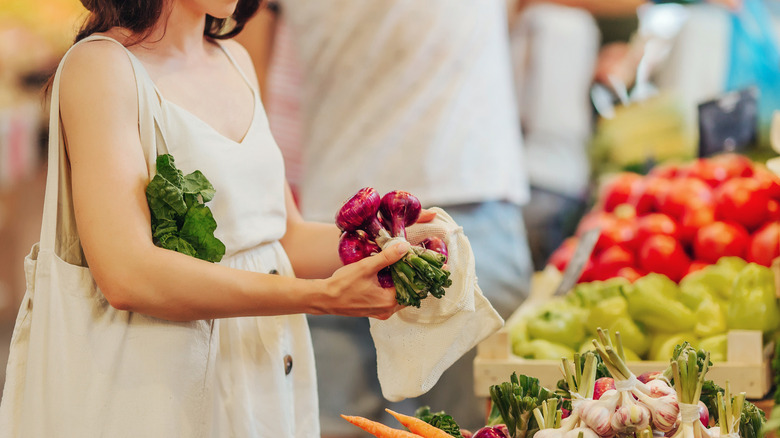 Woman shopping for produce