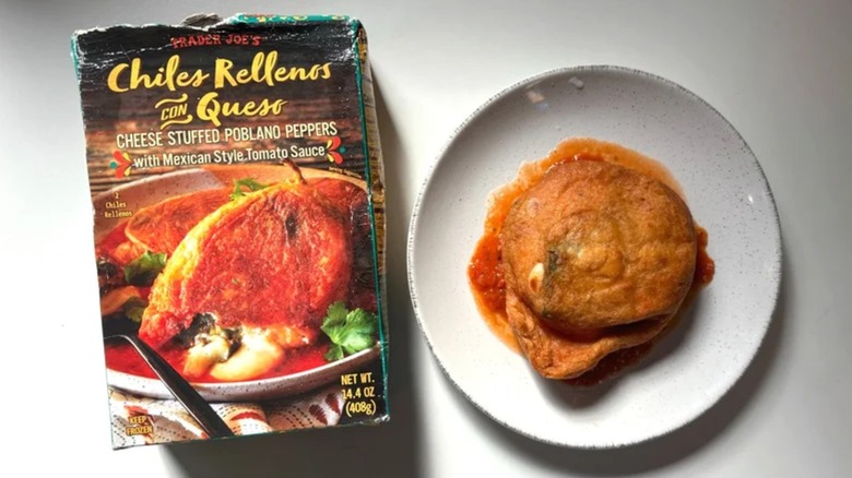Box of Trader Joe's Chiles Rellenos con Queso next to rellenos con queso on white plate