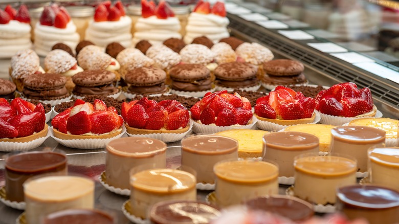 Display of desserts in a French patisserie pastry case