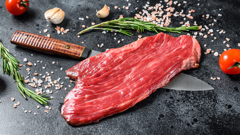 Merlot steak with kitchen knife