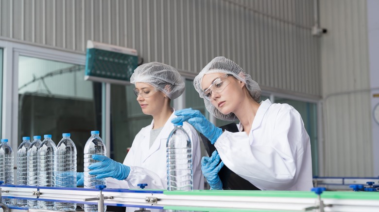 Scientists examining bottled water