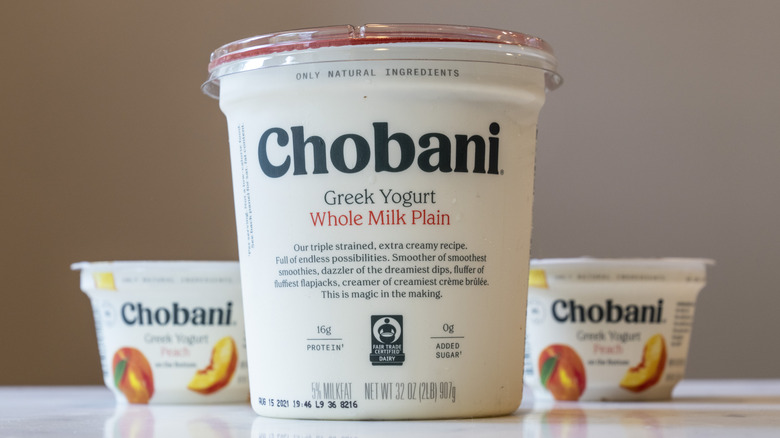 Three containers of Chobani peach and plain yogurt