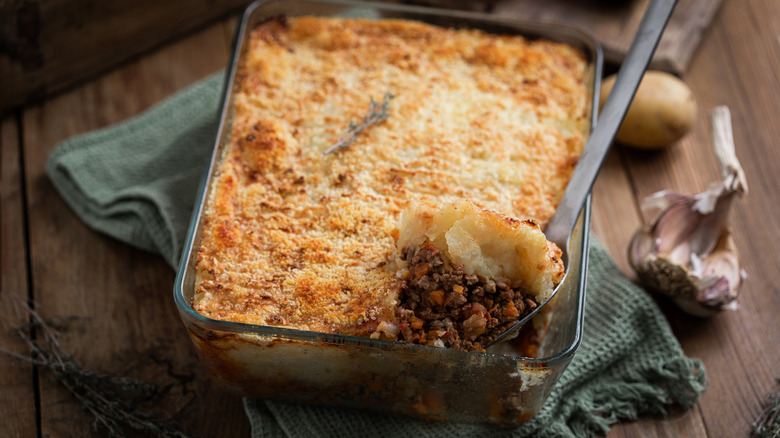 Shepherd's pie in square baking dish with spoon