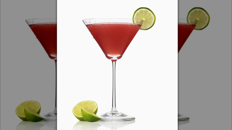 cosmopolitan cocktail with limes