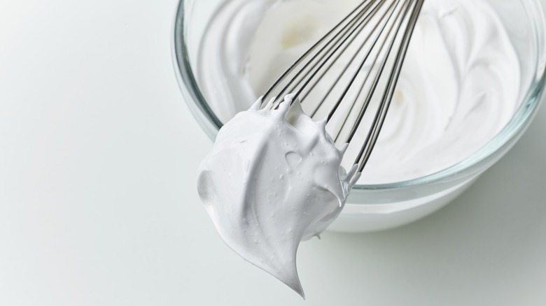 Whisk with whipped cream