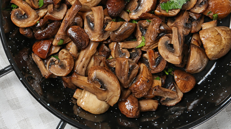 sauteed mushrooms in frying pan