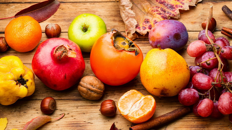 assorted autumn fruits on table
