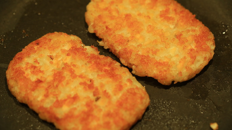 hash brown patties on grill