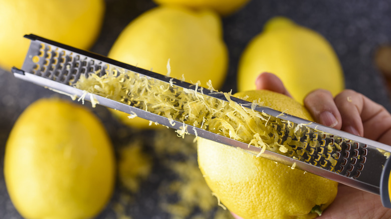 zesting a lemon using a microplane