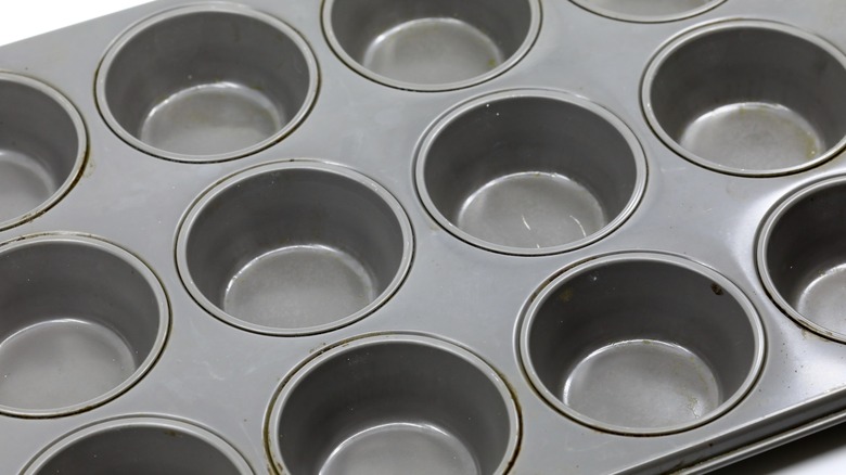 Empty metal muffin tin