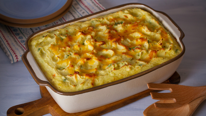 Casserole dish of creamy fisherman's pie