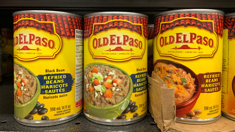 Cans of refried beans.