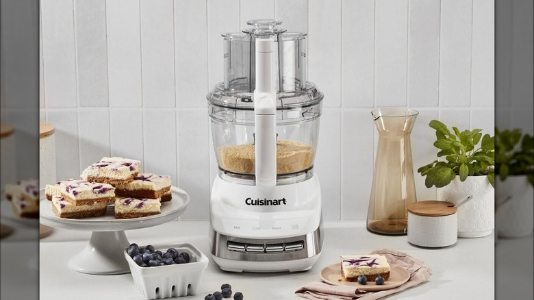 Cuisinart Core Custom Food Processor on kitchen counter next to blueberry cheesecake bars