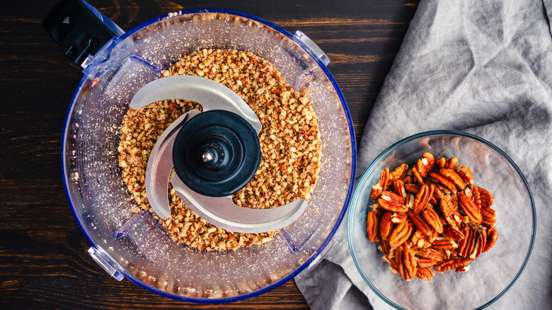 Ground pecans in a food processor