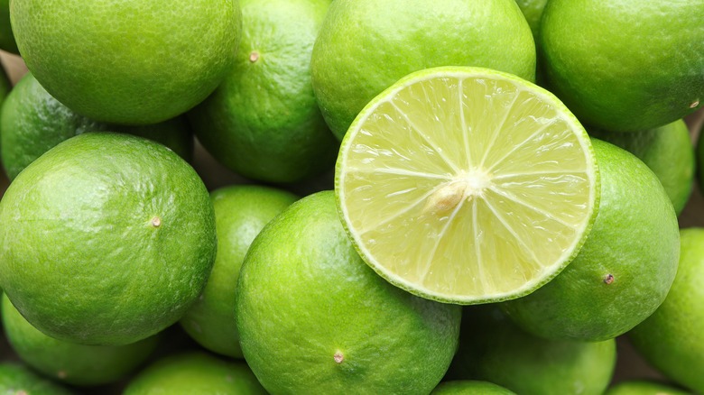 pile of limes with one cut down the center