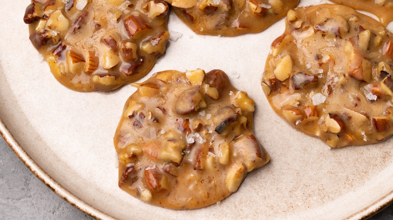 Caramel almond pralines on plate